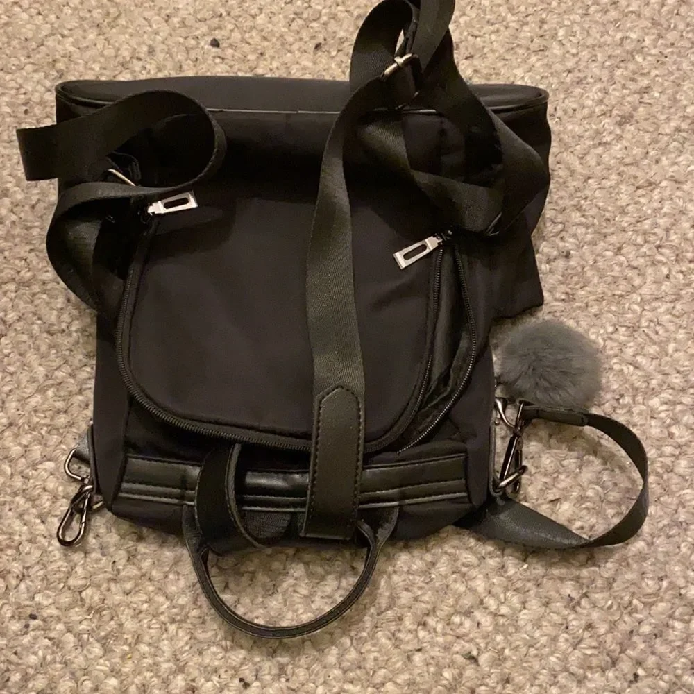 YaLuxe black nylon backpack.